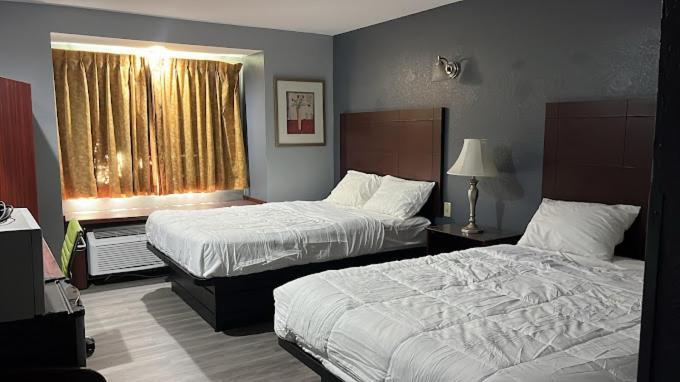 Blisspoint Inn & Suites, Northwood Екстер'єр фото
